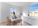 Modern dining area with built-in cabinets and window seat at 167 83Rd N Ave, St Petersburg, FL 33702