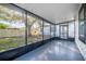 Relaxing screened porch overlooking backyard at 167 83Rd N Ave, St Petersburg, FL 33702