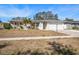 Charming single-story home with well-manicured lawn and inviting curb appeal at 1672 Cambridge Dr, Clearwater, FL 33756