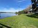 Enjoy the large lawn with a lakeside picnic area that residents can use at 2070 Lakeview Dr # 206, Clearwater, FL 33763