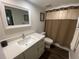 Updated bathroom with sleek vanity and white countertop, plus shower/tub combination at 2070 Lakeview Dr # 206, Clearwater, FL 33763