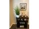 Stylish decor on a dark wood shelving unit adds character to this cozy home at 2070 Lakeview Dr # 206, Clearwater, FL 33763