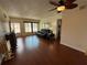 Inviting living room with hardwood floors, a sofa, and natural light, perfect for relaxation at 2226 Switzerland Way # 52, Clearwater, FL 33763