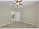 Light filled bedroom featuring wood floors, neutral paint and a ceiling fan at 237 Shell Falls Dr, Apollo Beach, FL 33572