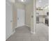 Entryway featuring tile flooring that leads to kitchen with stainless steel appliances at 237 Shell Falls Dr, Apollo Beach, FL 33572