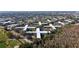 Aerial view of multi-unit dwellings, showing complex layout and ample parking at 2441 Persian Dr # 53, Clearwater, FL 33763