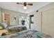 Bright bedroom with washer/dryer combo in closet at 2441 Persian Dr # 53, Clearwater, FL 33763