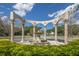 Beautiful outdoor fountain surrounded by well-maintained landscaping creating a serene and inviting atmosphere at 2441 Persian Dr # 53, Clearwater, FL 33763