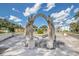 Unique outdoor space with decorative columns and lush greenery, perfect for relaxation and enjoying the scenery at 2441 Persian Dr # 53, Clearwater, FL 33763