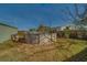 Backyard featuring an above-ground pool, a wooden fence, and green grass with a blue sky above at 2749 16Th N Ave, St Petersburg, FL 33713