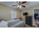 Bedroom featuring a ceiling fan, a neutral color scheme, and convenient access to adjacent rooms at 2749 16Th N Ave, St Petersburg, FL 33713