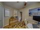 The living room area features a bamboo console table, hardwood floors, and neutral tones for comfortable living at 2749 16Th N Ave, St Petersburg, FL 33713