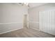 Neutral bedroom with a ceiling fan, carpeted floor, and a closet at 2811 Butterfly Landing Dr, Land O Lakes, FL 34638