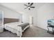 Spacious main bedroom with vaulted ceiling, ceiling fan, and carpet flooring at 2811 Butterfly Landing Dr, Land O Lakes, FL 34638