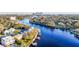 Aerial view of waterfront homes along the Hillsborough River and private boat docks at 2902 N Shoreview Pl, Tampa, FL 33602