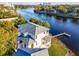 Stunning aerial view of a waterfront property boasting a private dock on the Hillsborough River at 2902 N Shoreview Pl, Tampa, FL 33602