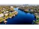 Gorgeous aerial view of the Hillsborough River showcasing waterfront homes with private docks and downtown skyline at 2902 N Shoreview Pl, Tampa, FL 33602