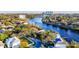 Stunning aerial view of waterfront homes along the Hillsborough River with downtown Tampa skyline in the distance at 2902 N Shoreview Pl, Tampa, FL 33602