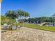 Backyard patio with firepit overlooking the river and dock at 2902 N Shoreview Pl, Tampa, FL 33602