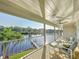 Relaxing balcony with comfortable seating overlooking the river at 2902 N Shoreview Pl, Tampa, FL 33602