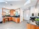 Beautiful bathroom showcasing granite counters, wood cabinets, dual sinks, and a vanity area at 2902 N Shoreview Pl, Tampa, FL 33602