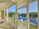 Screened porch with view of the water at 2902 N Shoreview Pl, Tampa, FL 33602