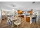 Bright dining room features hardwood floors and a wood table at 4043 93Rd N Ter, Pinellas Park, FL 33782