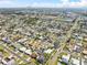 Wide angle aerial view showcases neighborhood, nearby pond and the location of the property at 4414 W Paris St, Tampa, FL 33614