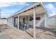 Wide angle view of a large carport showing a mini fridge and bikes at 4414 W Paris St, Tampa, FL 33614