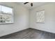 Bright bedroom with modern flooring and natural light from the window at 5885 114Th N Ter, Pinellas Park, FL 33782