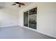 Covered patio showing the sliding glass doors to the inside of the home at 5885 114Th N Ter, Pinellas Park, FL 33782