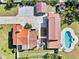 Overhead view of a home with a pool, well-kept landscaping, and multiple structures at 6010 17Th S Ave, Gulfport, FL 33707