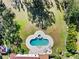 Aerial image displaying a clover-shaped swimming pool at 6010 17Th S Ave, Gulfport, FL 33707