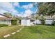 Neat backyard shed with stepping stones and well maintained lawn at 6010 17Th S Ave, Gulfport, FL 33707