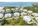 An aerial view shows the buildings near the ocean at 7611 34Th W Ave # 303, Bradenton, FL 34209