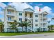 Three-story building with balconies and a white spiral staircase, beautifully designed at 7611 34Th W Ave # 303, Bradenton, FL 34209