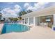 A community pool with outdoor seating and dining areas at 7611 34Th W Ave # 303, Bradenton, FL 34209