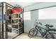 A storage closet is filled with many belongings and a bicycle at 7611 34Th W Ave # 303, Bradenton, FL 34209