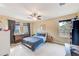 Bright bedroom with ceiling fan, dresser, and lots of natural light at 780 Spring Flowers Trl, Brandon, FL 33511