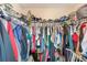 Walk-in closet with wire shelving and hanging clothes for storage at 780 Spring Flowers Trl, Brandon, FL 33511