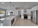 Modern kitchen featuring stainless steel appliances, a large island, and sleek cabinetry at 9693 58Th N St, Pinellas Park, FL 33782