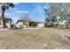 Expansive backyard with stone mulch at 1004 Regal Manor Way, Sun City Center, FL 33573