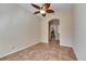 Bright dining room featuring neutral paint, tile floors, and views of the kitchen at 1004 Regal Manor Way, Sun City Center, FL 33573