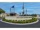 An eye-level view of the Sun City Center Veterans Memorial encircled by beautiful landscaping and greenery at 1004 Regal Manor Way, Sun City Center, FL 33573