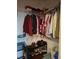 Organized closet with shelving, hanging rods, and shoe storage at 1050 Starkey Rd # 2503, Largo, FL 33771