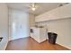 Laundry room featuring modern appliances and tile flooring at 1228 Caloosa Creek Ct, Sun City Center, FL 33573