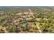 An overhead shot of property reveals its tranquil positioning in its surrounding landscape near road at 13386 Taylor St, Brooksville, FL 34613