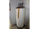 A white insulated electric hot water heater for the house at 13386 Taylor St, Brooksville, FL 34613