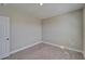 Bedroom with neutral walls and carpet at 16725 Barnwood Pl, Bradenton, FL 34211