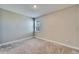 Neutral bedroom featuring carpeting and a window offering natural light at 16725 Barnwood Pl, Bradenton, FL 34211